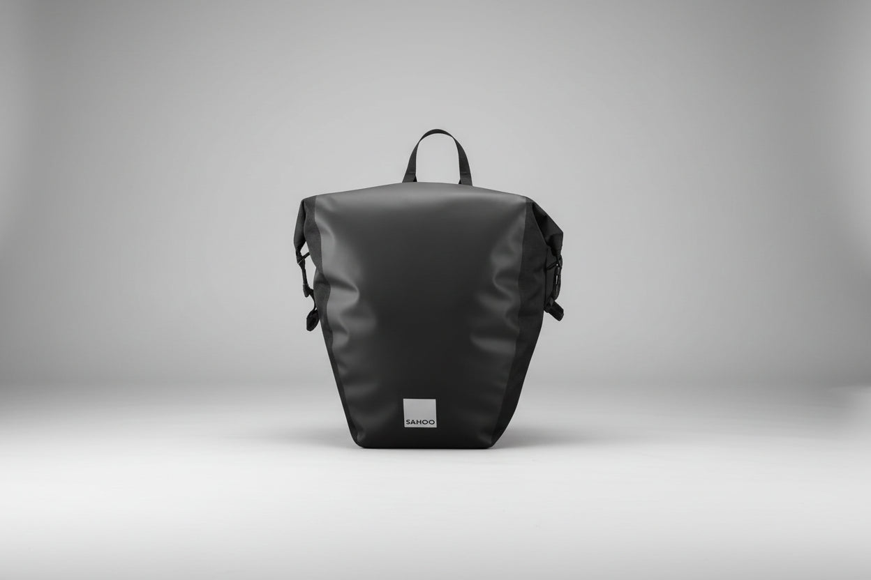 Black backpack with a visible brand logo on a white background